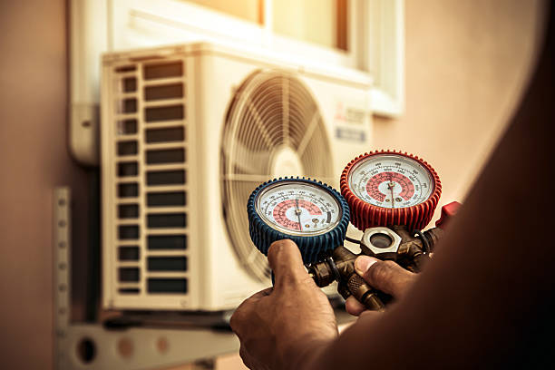 Professional Air Conditioning Service technician working in Blacksville, WV